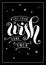 Modern calligraphy lettering of Let your wish come true in white with decorative elements, border and stars on black background