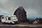 Modern camper van motor home parked on the road with amazing scenic landscape view. Concept of travel and vacation. Exploring