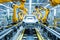 Modern car manufacturing factory, automobile assembly line, automotive industry