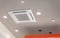 Modern ceiling mounted cassette type air conditioning system in coffee shop