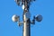 Modern Cellular Tower - Communication on Blue Sky. Vertical Photography.