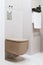 Modern ceramic toilet bowl with water tank hidden in wall