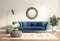 Modern chic classic interior with blue sofa and stools