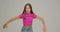 Modern child girl dancing, cool moving in dance school studio. Stylish schoolgirl dancer perform contemporary dance