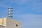 Modern chimney on the roof of hi tech home.