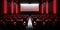 Modern Cinema Room with Red Seats and Ambient Side Lighting. Empty Movie Room with Wide screen. Viewed Over Screen