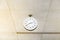 Modern circle clock hang on ceiling under building