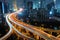 Modern city traffic road at night. Transport junction.