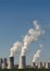 Modern coal power station with blue sky as background, portrait format