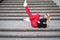 Modern collection. Fashionable handsome smiling girl in stylish sunglasses wearing black shirt, red leggings and trendy white