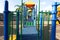 Modern colorful kids playground - swings, slides, steps and ladders. Outdoor plastic playing area for children