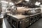 modern commercial kitchen with ovens, ranges, and mixers in stainless steel