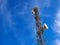 Modern communication radar tower against blue sky