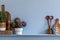 Modern composition on the kitchen interior with vegetables cutting board, food, herbs, kitchen accessories and copy space .