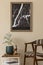 Modern composition of living room interior with brown mock up poster frame.