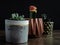 Modern concrete planters with cactus plant or succulent plant on wooden table