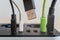 Modern convenient multi-port usb charger for devices. Close-up of inserted multi-colored cables in a power outlet. Macro