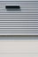 Modern corrugated iron facade with ventilation slot