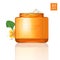 Modern cosmetics ads, nutritive facial cream. Elegant orange gold glass open bottle with cream, on white with flower of p