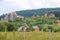 Modern cottages on slopes of forested mountains. Carpathians