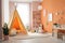 A modern and creative playroom where a cozy and comfortable space is adorned with stylish decor, a wigwam and colorful toys