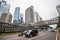 Modern crossing bridge in the busy Sudirman Street traffic, Central Business District of Jakarta, Indonesia