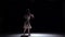 Modern dancer girl in white dress continue dancing contemporary on black, shadow, slow motion