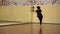 Modern dancer warming in a studio with mirrors. Girl training dance