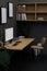 Modern dark stylish workspace interior design with pc computer on wood table