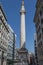 Modern-day View of the Monument to the Great Fire of London fluted Doric column built of Portland stone topped with a gilded urn