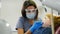 Modern dentist office. Portrait of female dentist treating little red-haired girl in dental clinic. Pediatric dentistry