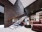 Modern design staircase in the living room, with glass railings and white independent steps on the brick wall