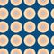 Modern dots seamless pattern in blue, light beige, peach, baby blue.