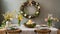 A modern Easter table decoration with a floral Easter wreath hanging on the wall