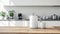 a modern electric kettle sitting beside a cup on a wooden table in a light-filled, minimalist kitchen, portraying the