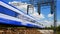 Modern electric passenger train moving on full speed