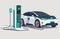 Modern electric sedan car charging parking at fast charger ev station with a plug in cable. Electrified battery vehicle