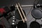 Modern electronic drum kit on grey background, above view. Musical instrument