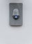 Modern eletric buzzer with blue symbol.