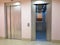 Modern elevator with opened and closed doors