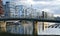 modern elite district of frankfurt, pedestrian bridge, boats and yachts moored on banks Main river, region canals and marina,