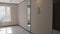 Modern entrance with white walls. Stock footage. Third floor of a modern new hall in a multi storey building.