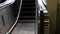 Modern escalator electronic moving up or down staircase escalator at airport or subway.