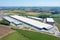 Modern European logistics warehouse for worldwide delivery of goods, warehouse, aerial view