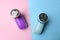 Modern fabric shavers on color background, flat lay