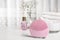 Modern face cleansing brush on white. Cosmetic accessory