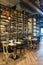 Modern Fine Dining Restaurant decorated with steel and open ceiling with liquor cellar inside in Bangkok, Thailand