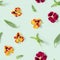Modern floral seamless pattern with pansy flowers, green leaves, small summer flowery seasonal styling