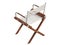 Modern folding wooden chair with fabric seat and backrest. 3d render