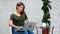 Modern freelancer woman working use laptop sitting at cafe. Shot on RED Raven 4k Cinema Camera